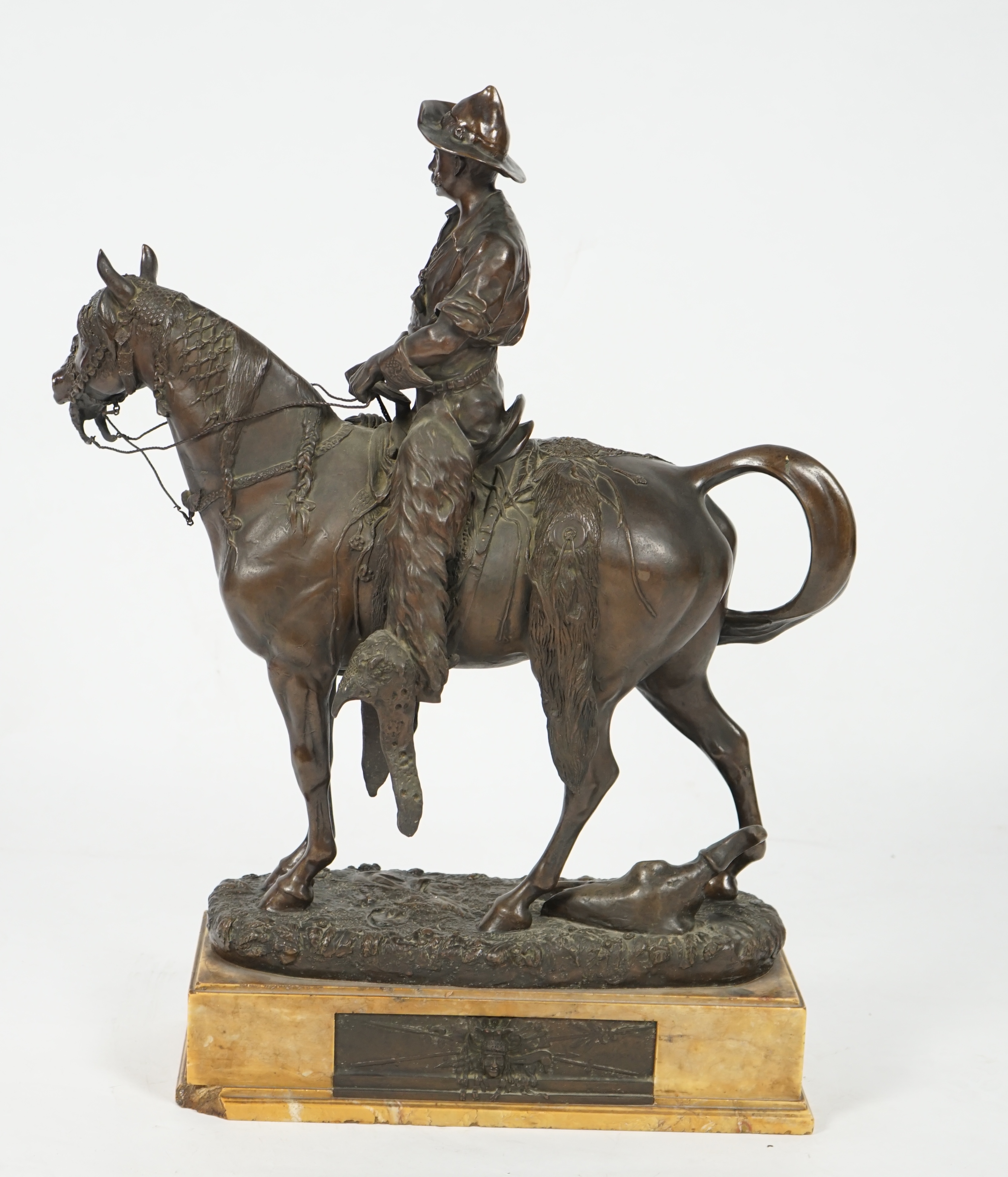 Walter Winans (St. Petersburg, 1852-Parsloe Park, Essex, 1920), a cast bronze of the artist, as a cowboy, riding the Arab stallion Skowronek, 50cm wide, 66cm high, overall 79.5cm high